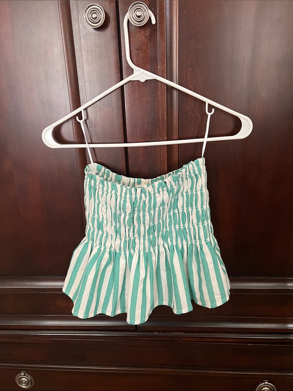 Strapless green and cream striped top
